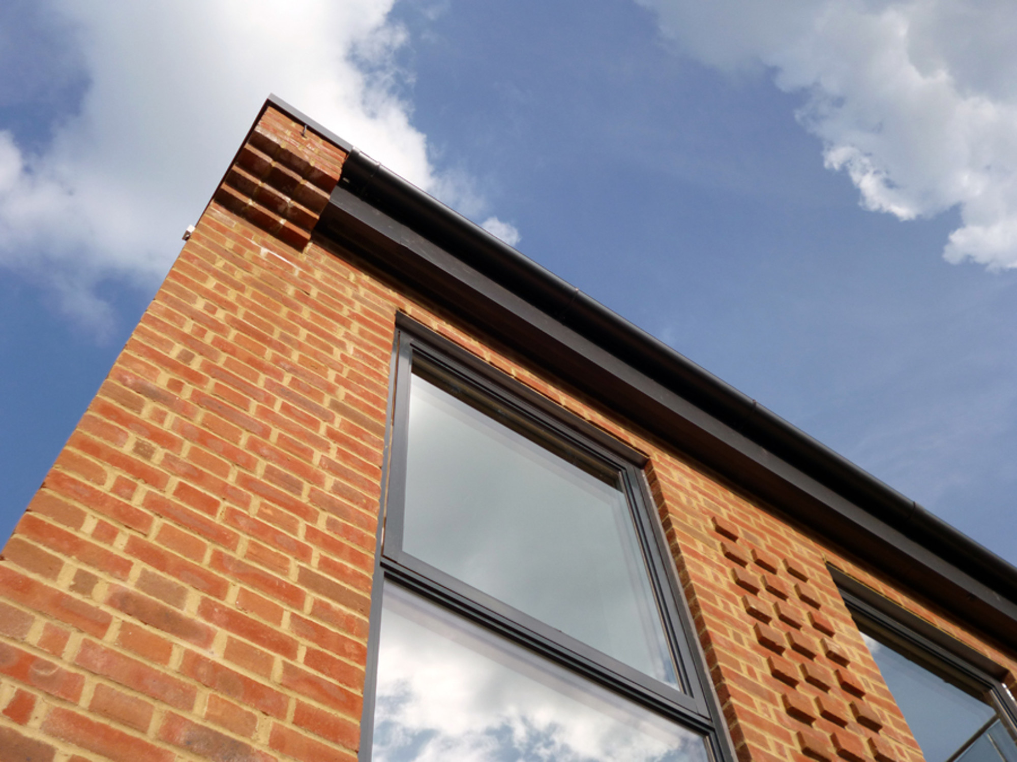 Aluminium guttering by Marley Alutec e4 brick house