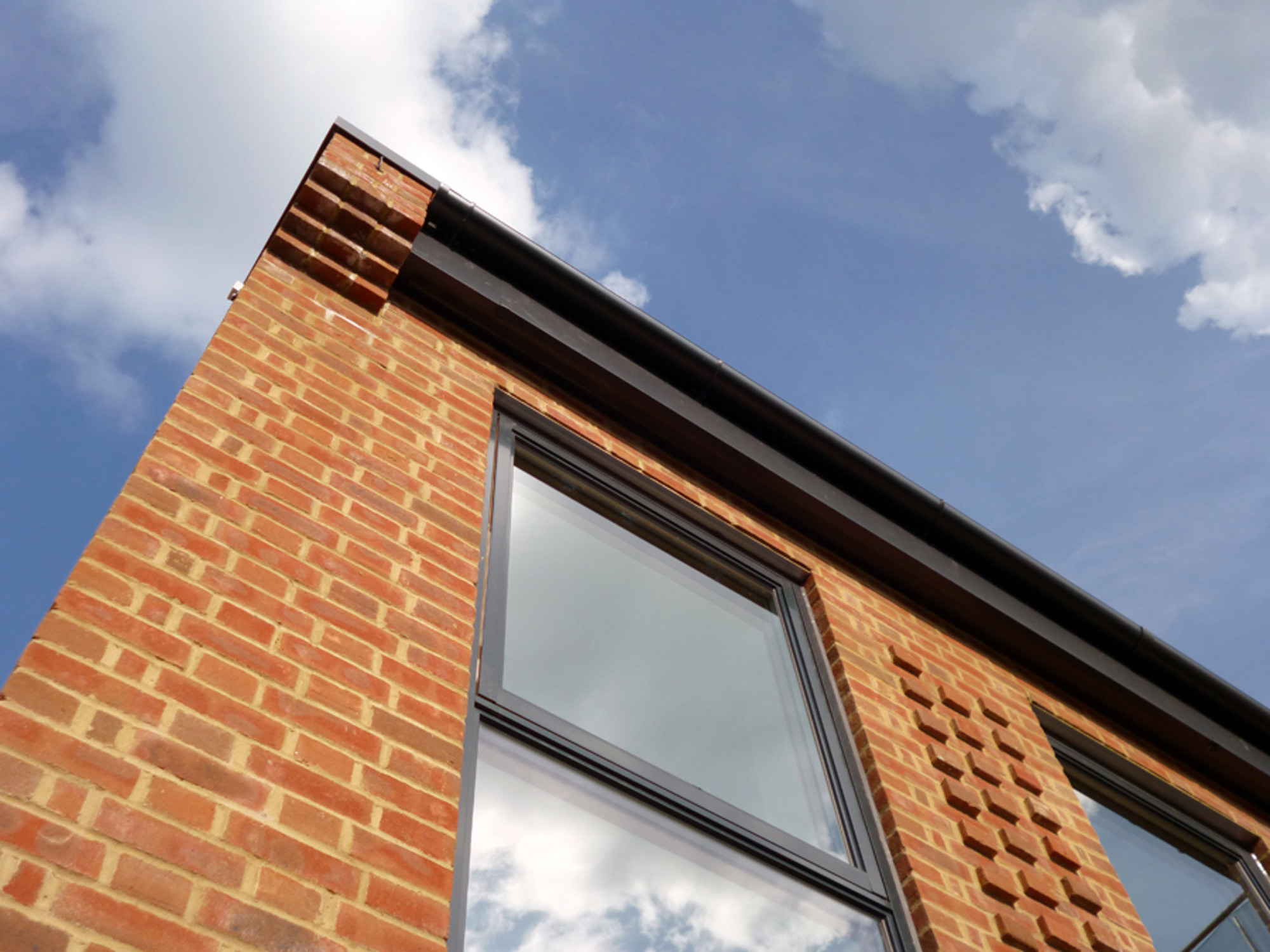 Aluminium guttering by Marley Alutec e4 brick house Aluminium guttering by Marley Alutec e4 brick house