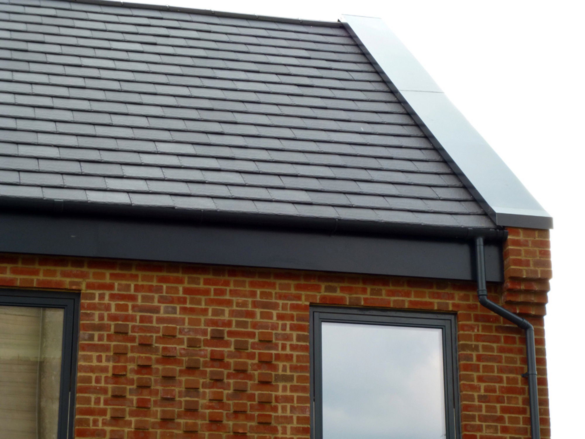 Aluminium guttering by Marley Alutec e4 brick house Aluminium guttering by Marley Alutec e4 brick house